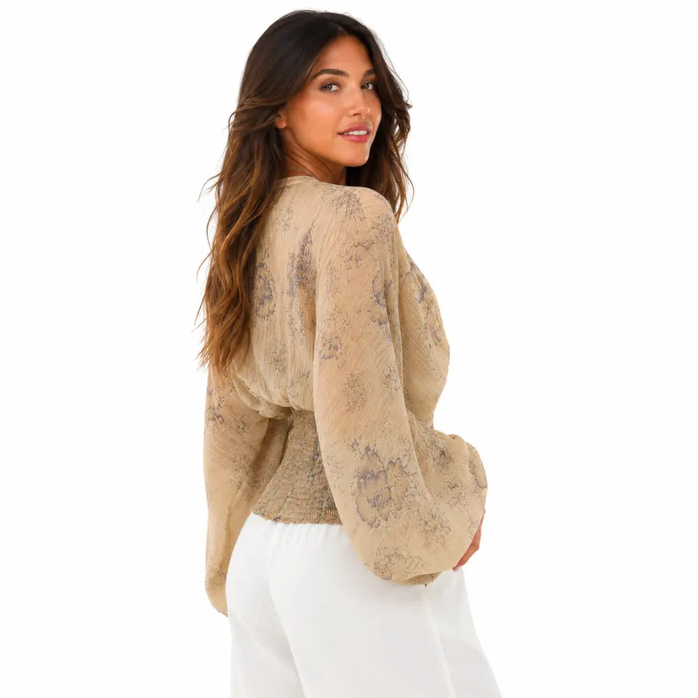 Blusa feminina estampada com mangas morcego
